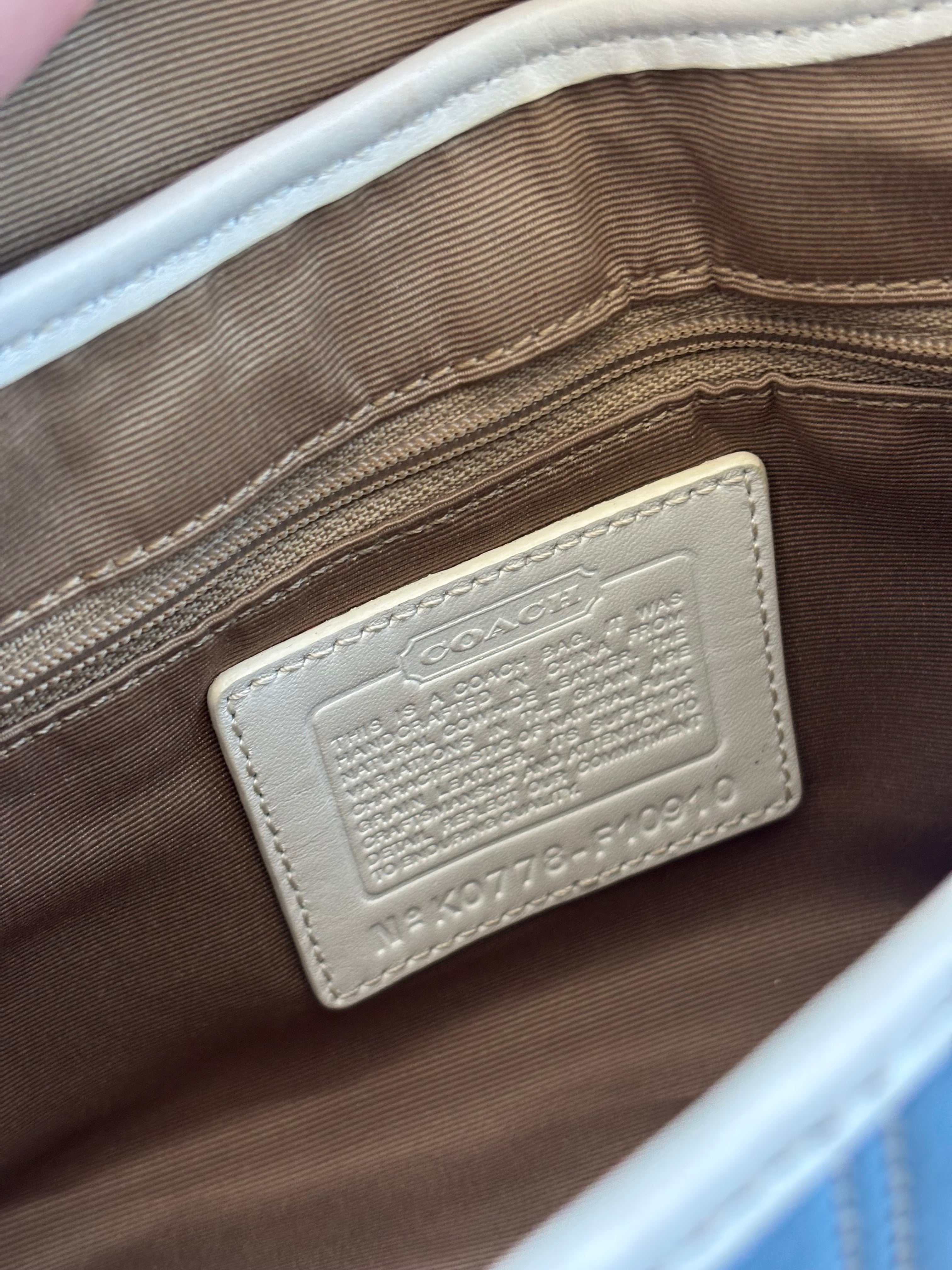Vintage Coach Baby Blue & white soho leather handbag with silver buckle