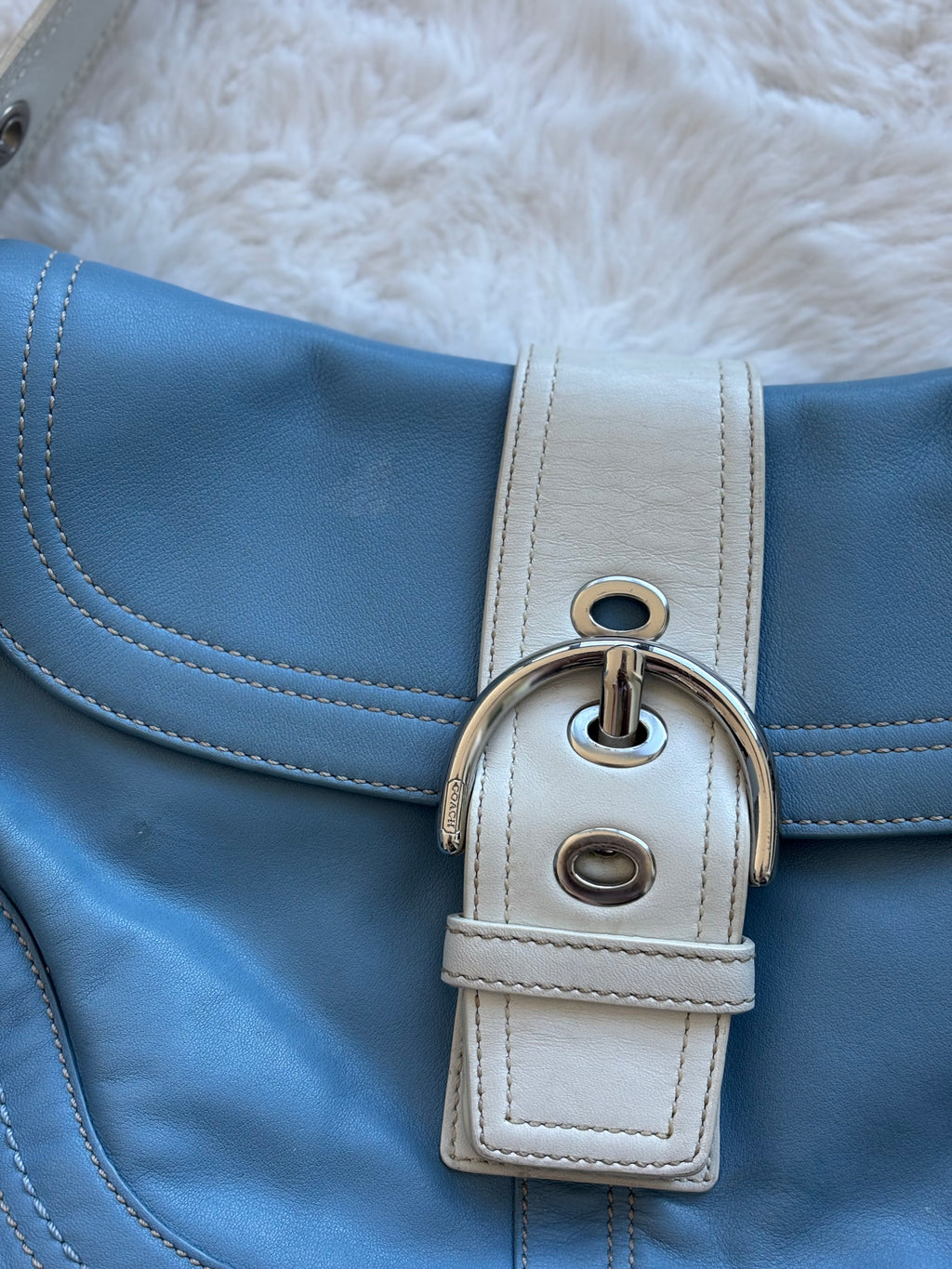 Vintage Coach Baby Blue & white soho leather handbag with silver buckle