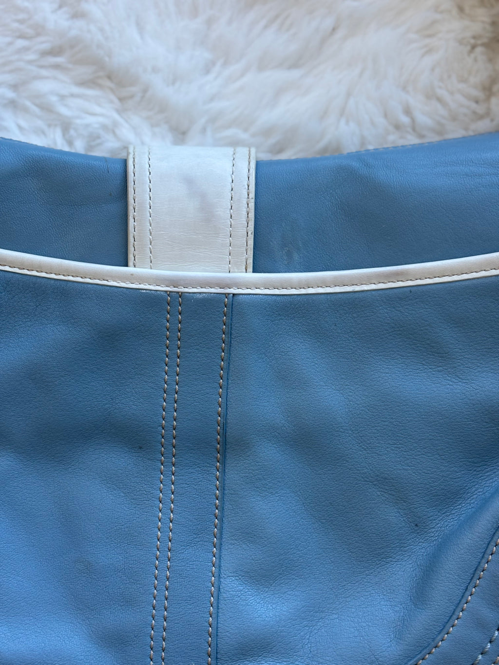 Vintage Coach Baby Blue & white soho leather handbag with silver buckle