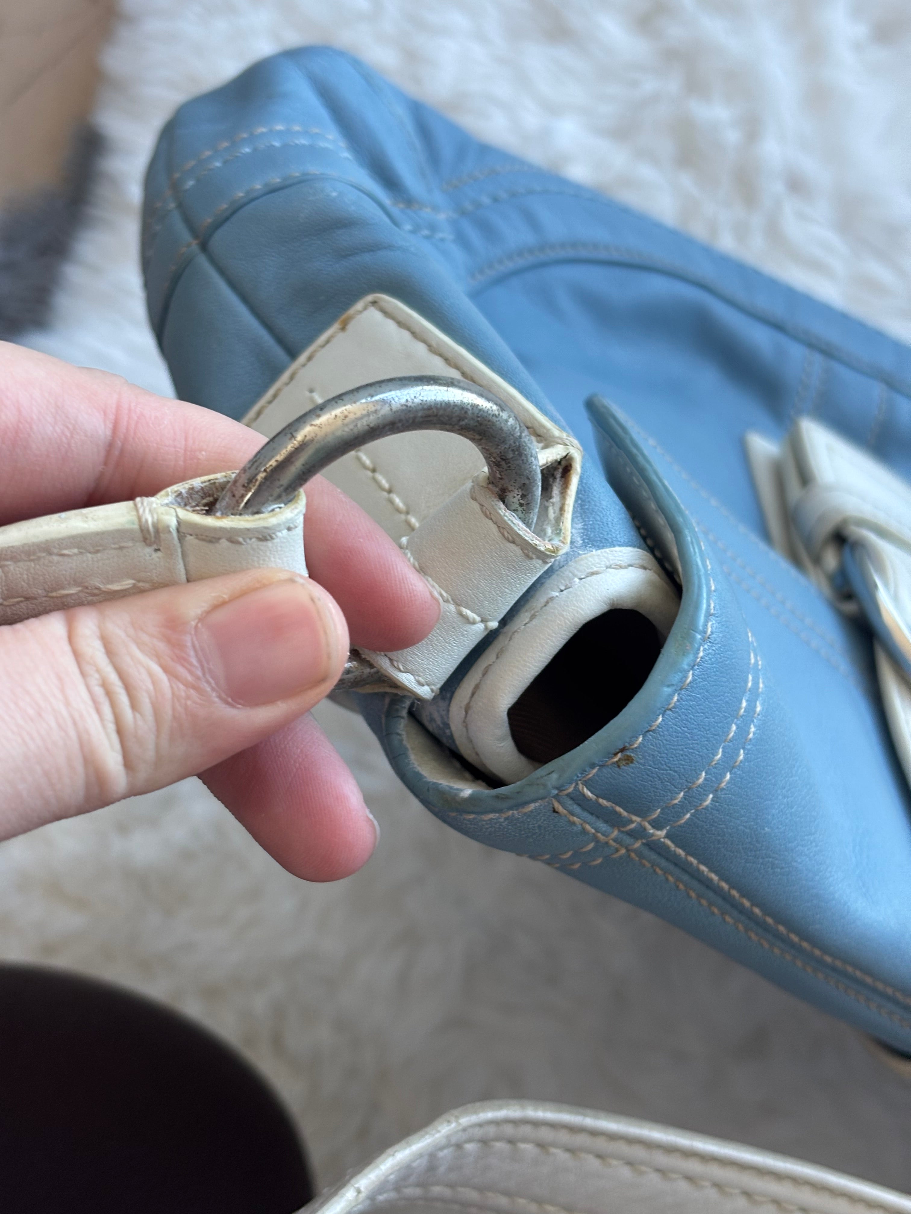 Vintage Coach Baby Blue & white soho leather handbag with silver buckle